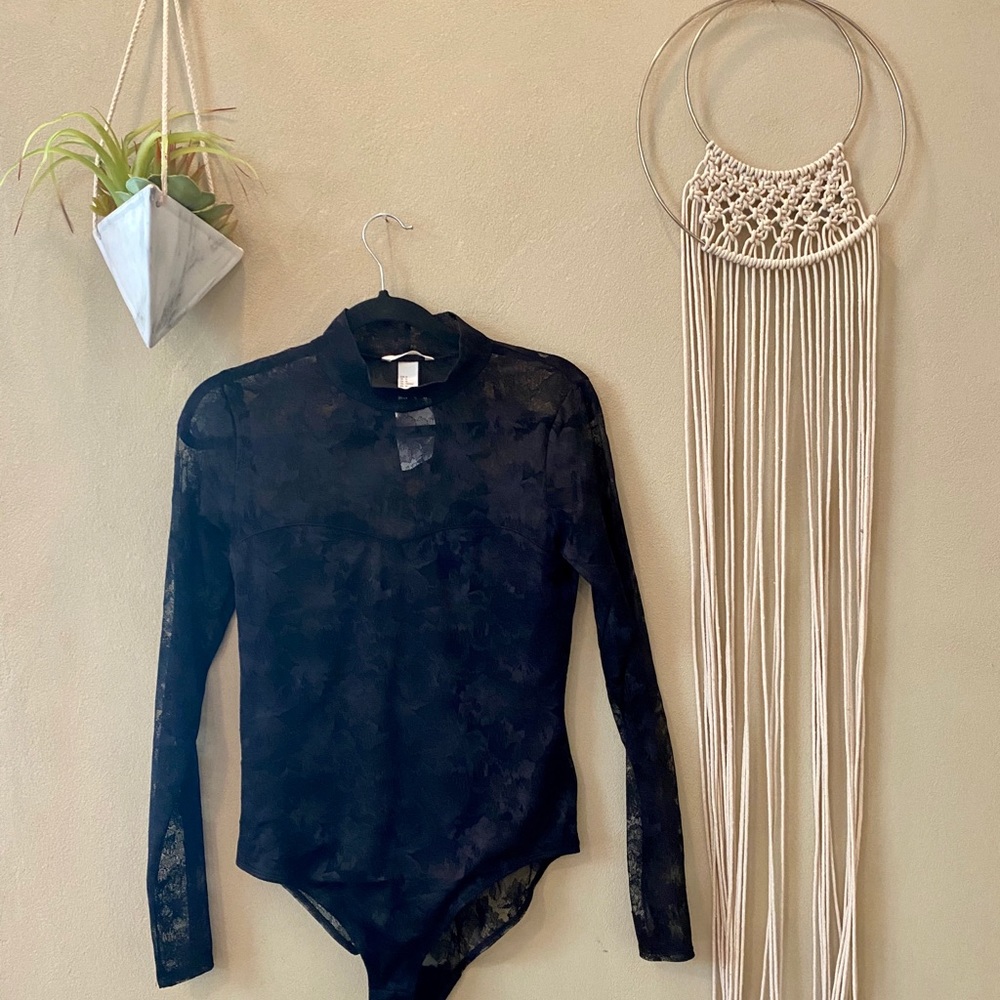 Black body suit fancy!